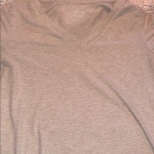 a tan v-neck